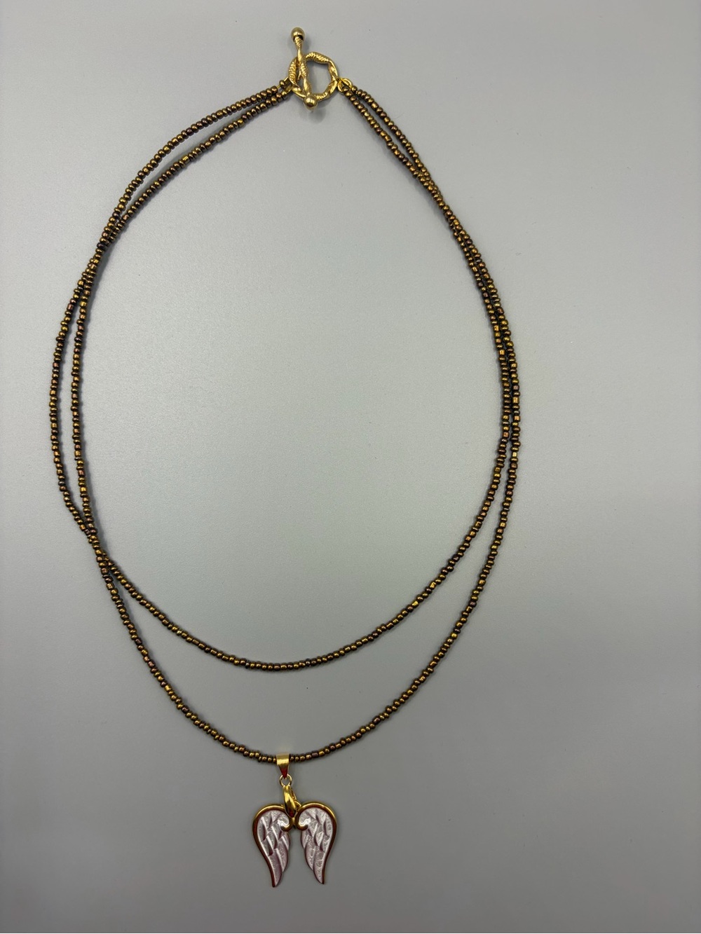 Gold and Brown Angel Wing Pendant Necklace